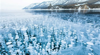 Un’enorme estensione di metano congelato al largo della costa orientale siberiana potrebbe costituire una nuova, temibile, fonte di questo potente gas serra e accelerare l'aumento delle temperature globali.